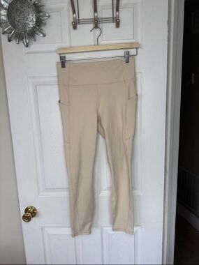 Fabletics Women's PureLuxe High-Waist Pocket Leggings — Cream 7/8 length  Sz M